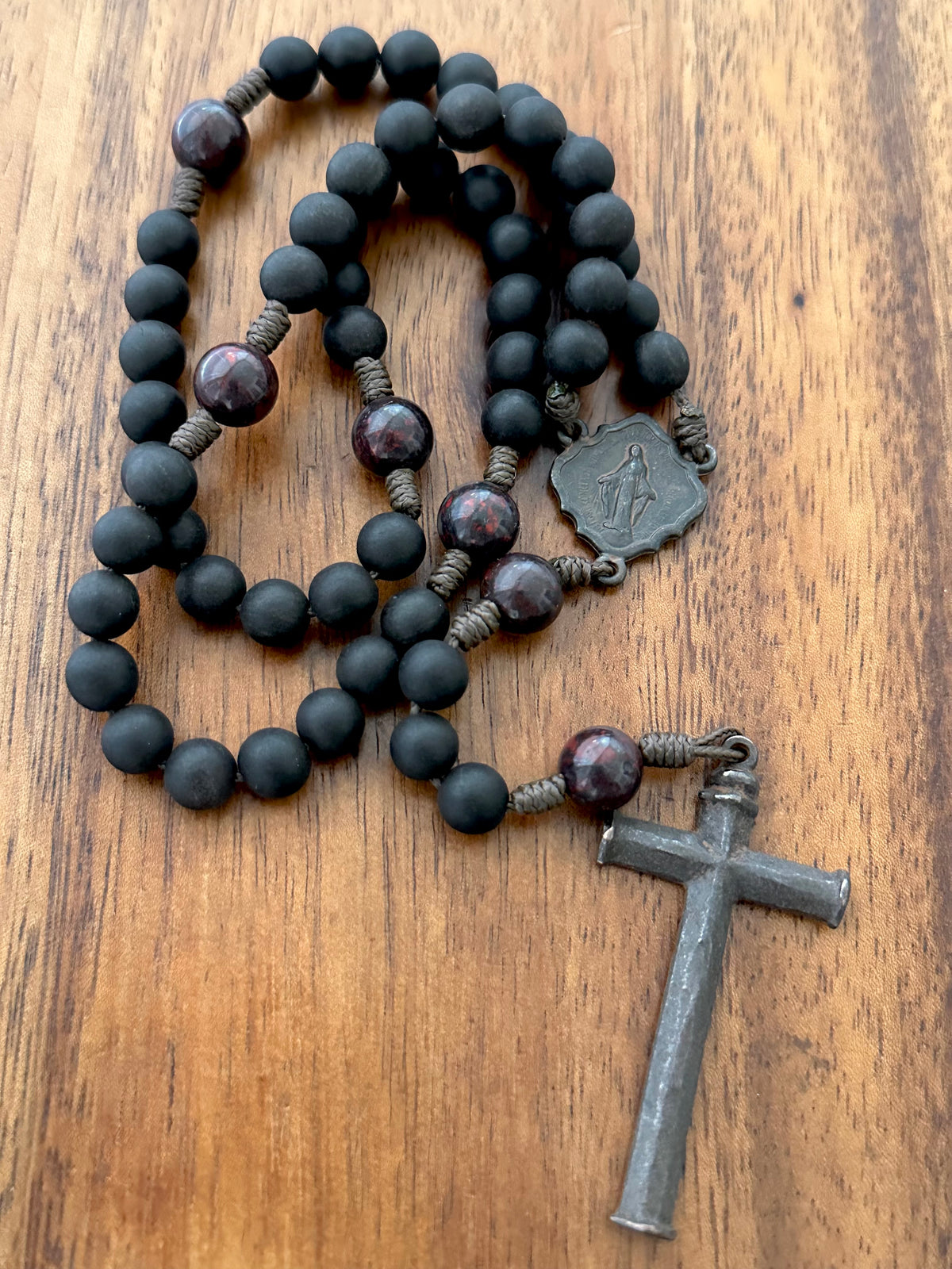 The Rosary of the Passion, Medium